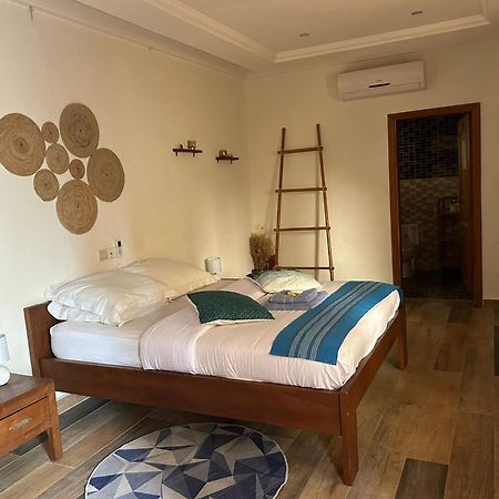 L'Oasis Guesthouse Cotonou Luaran gambar