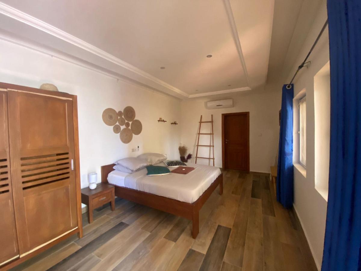 L'Oasis Guesthouse Cotonou Luaran gambar
