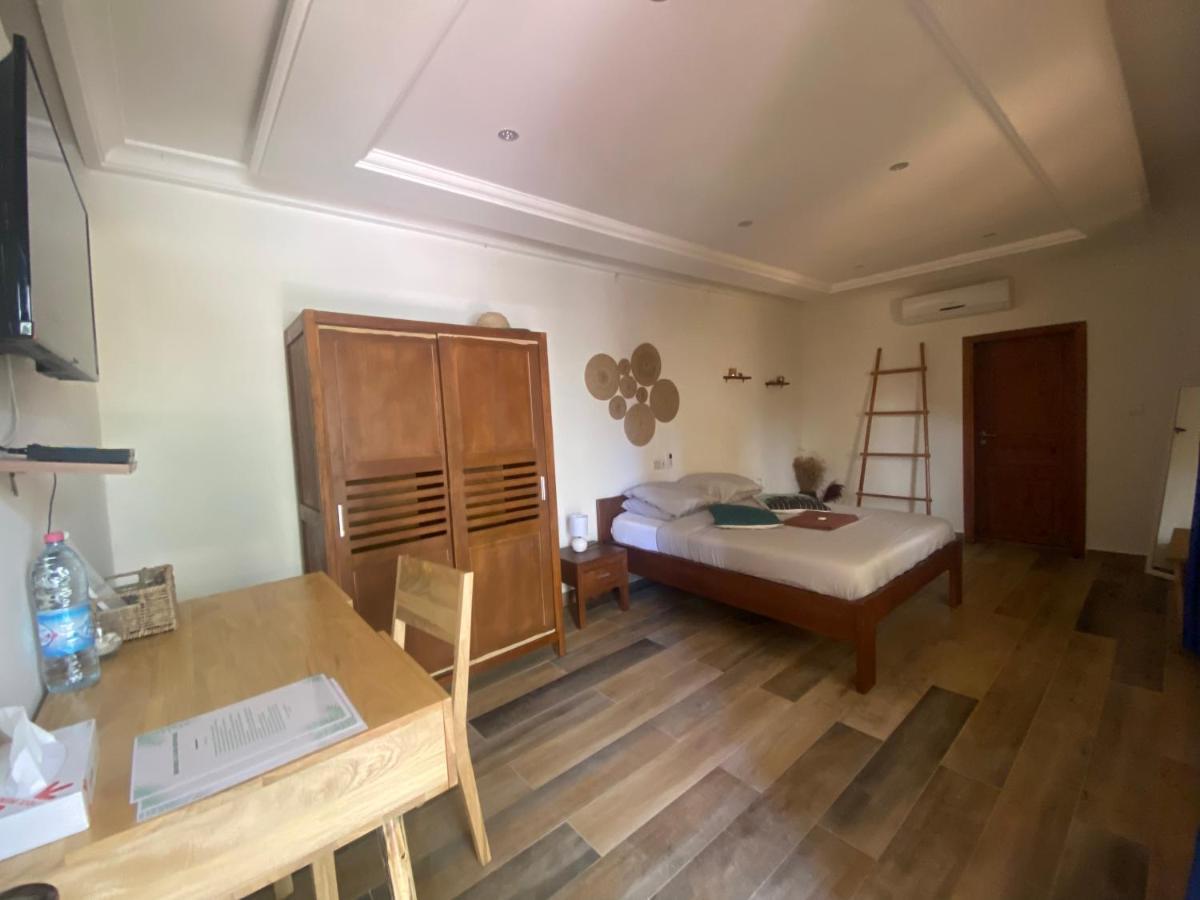L'Oasis Guesthouse Cotonou Luaran gambar