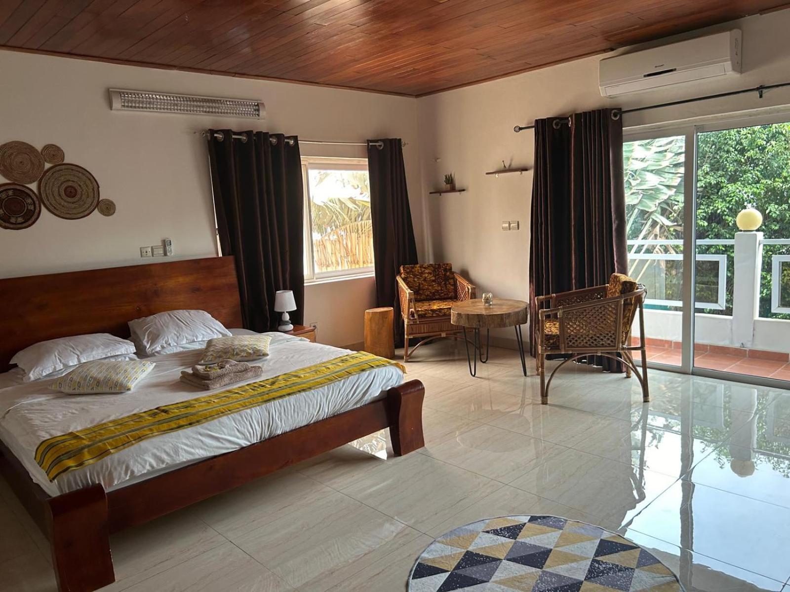 L'Oasis Guesthouse Cotonou Luaran gambar
