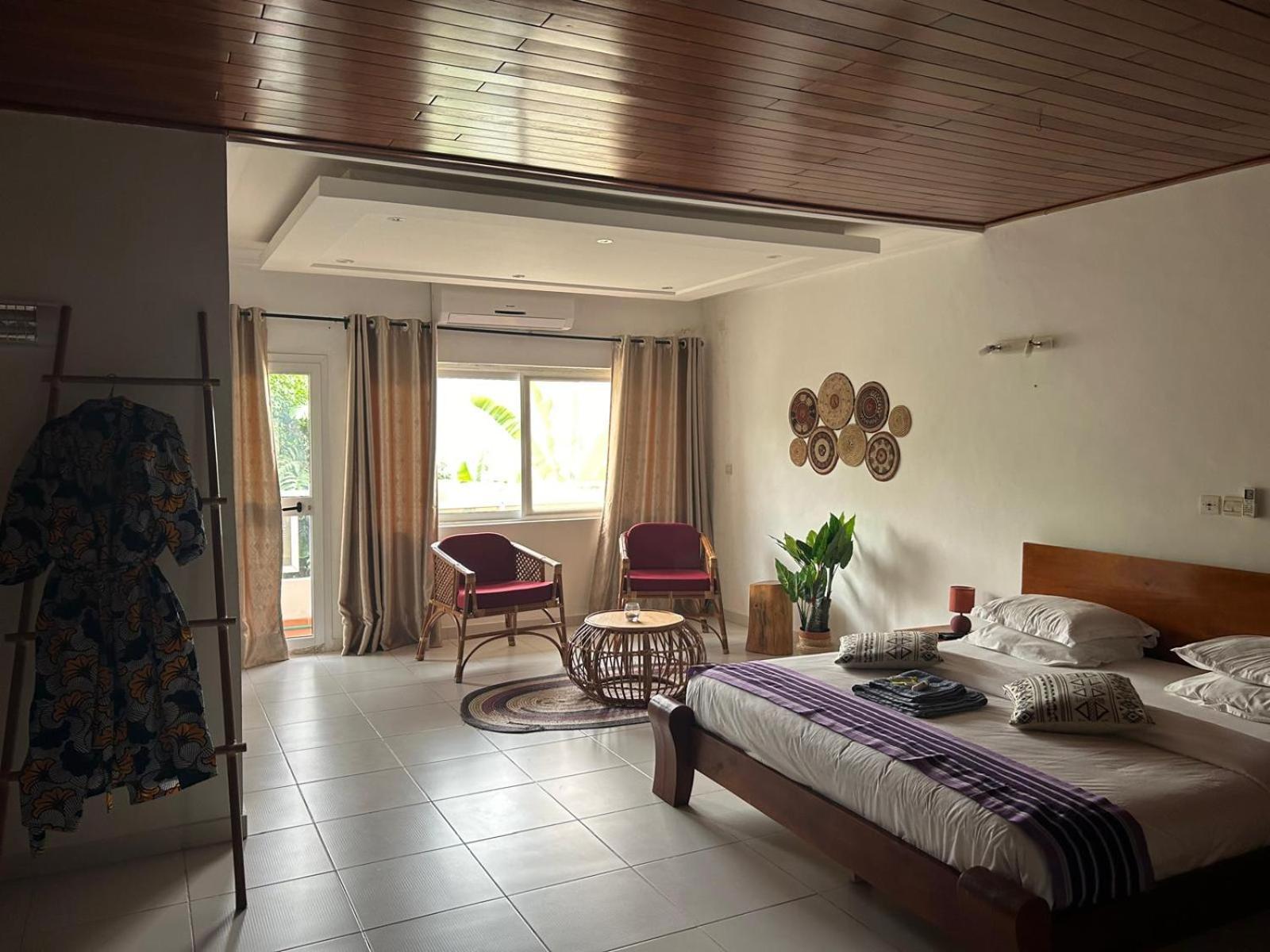 L'Oasis Guesthouse Cotonou Luaran gambar