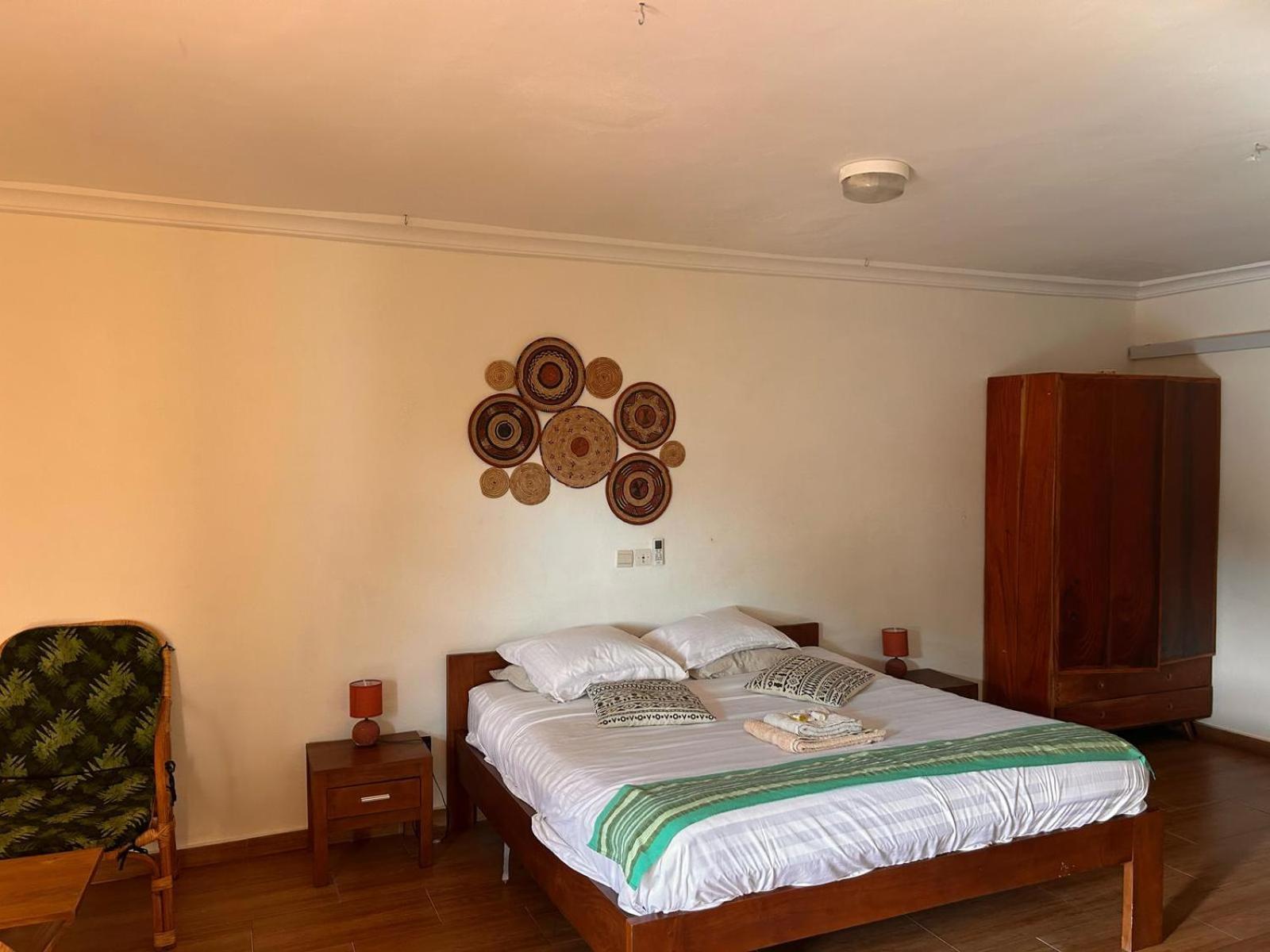 L'Oasis Guesthouse Cotonou Luaran gambar